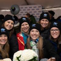 group photo in alumni hats